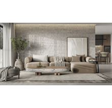 Lichte woonkamer met hoekbank, salontafel en decoratieve wandbekleding