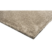 Close-up van een beige tapijt