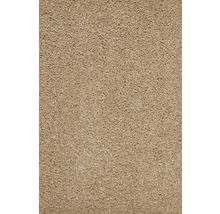 Close-up van een beige tapijt met dichte textuur
