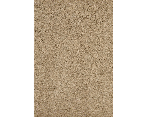 Close-up van een beige tapijt met dichte textuur