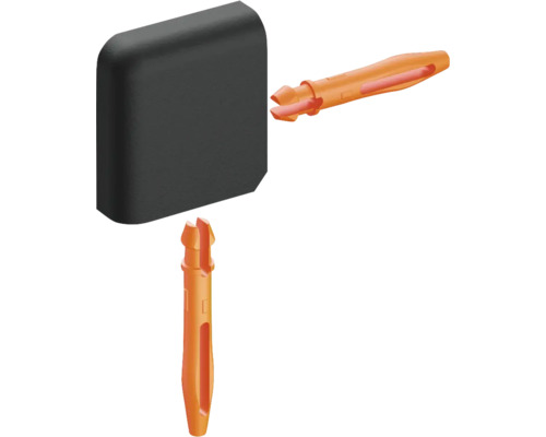 Meubelverbinderset met een zwart hoekstuk en twee oranje spreidpluggen van kunststof.