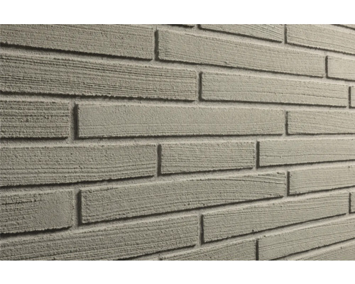 Gestructureerde wandbekleding in steenlook met horizontale groeven.
