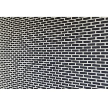 Close-up van een gevel met metselwerk