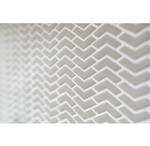 Detailaanzicht van tegels in pijldesign voor wanddecoratie
