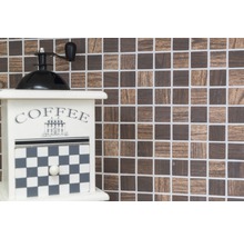 Decoratieve koffiemolen voor mozaïekachtergrond