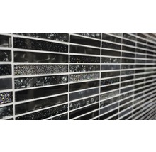 Detailopname van mozaïektegels in zwart met glitters
