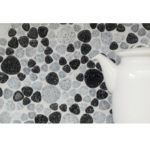 Mozaïektegels in steenlook met theepot