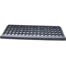 Rubberen mat met gaten