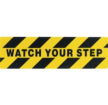 Sticker met de tekst Let op uw stap en waarschuwingsstrepen