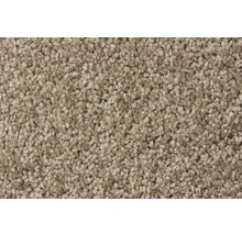 Close-up van een beige tapijt.