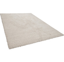 Beige hoogpolig tapijt