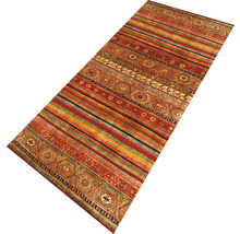 Vloerkleed met streepmotief en geometrische figuren