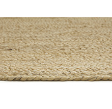 Close-up van een gevlochten vloerkleed van natuurlijke vezels