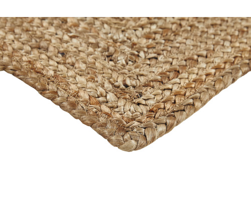 Detail van een gevlochten vloerkleed