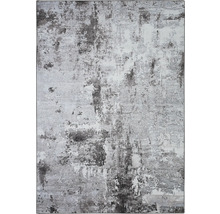 Tapijt met abstract patroon in verschillende grijstinten.