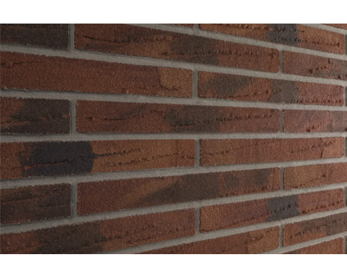 Close-up van een muur met baksteenstrips