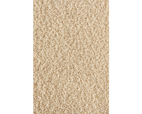 Close-up van een beige tapijt.