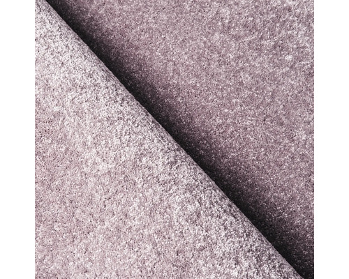 Close-up van een opgevouwen tapijt met textuur
