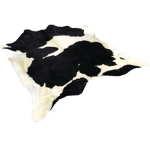 Tapijt in koeienhuid design