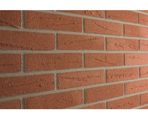 Close-up van een muur van bakstenen.