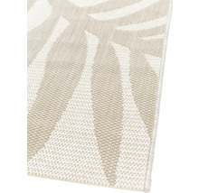 Detailweergave van een buitenkleed met bladmotief