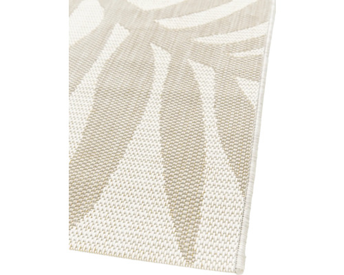 Detailweergave van een buitenkleed met bladmotief