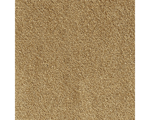 Close-up van een beige tapijt.